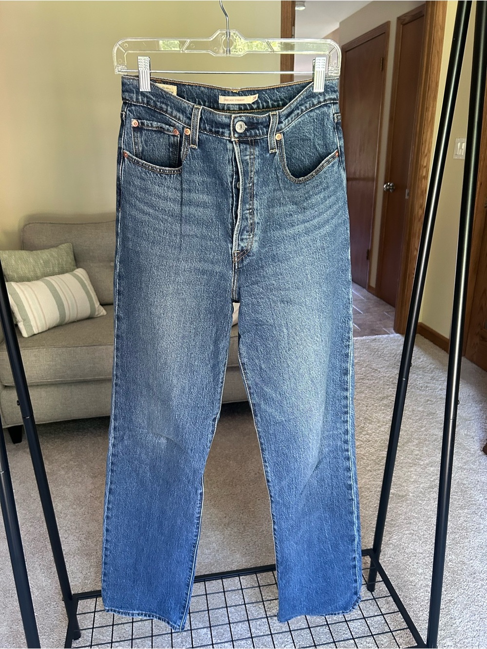 Levi's Women's rib cage Boot Cut Jeans in Medium Blue Wash